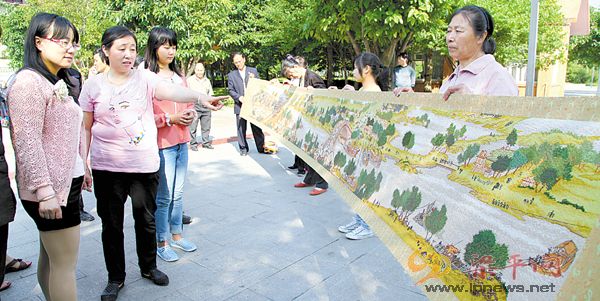 梁山街道：市民兩年繡出6米長《清明上河圖》十字繡